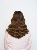 Long wavy hair in rich dark brown tones styled to showcase Extra Hair Extension Piece - Dark Brown Mix 