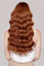 Back view of long wavy hair showcasing Dark Auburn 
