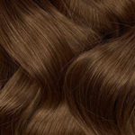 Close-up of smooth, shiny brown hair strands featuring the Extra Hair Extension Piece - Brown 