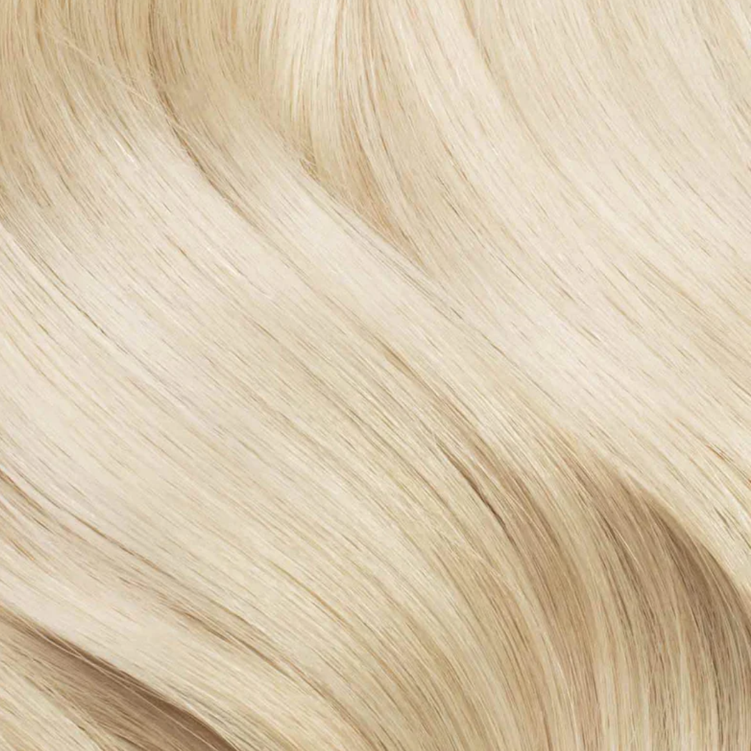 Extra Piece Buttercream Blonde #60 (FINAL SALE NO RETURNS) smooth blonde hair extension piece shown close-up.