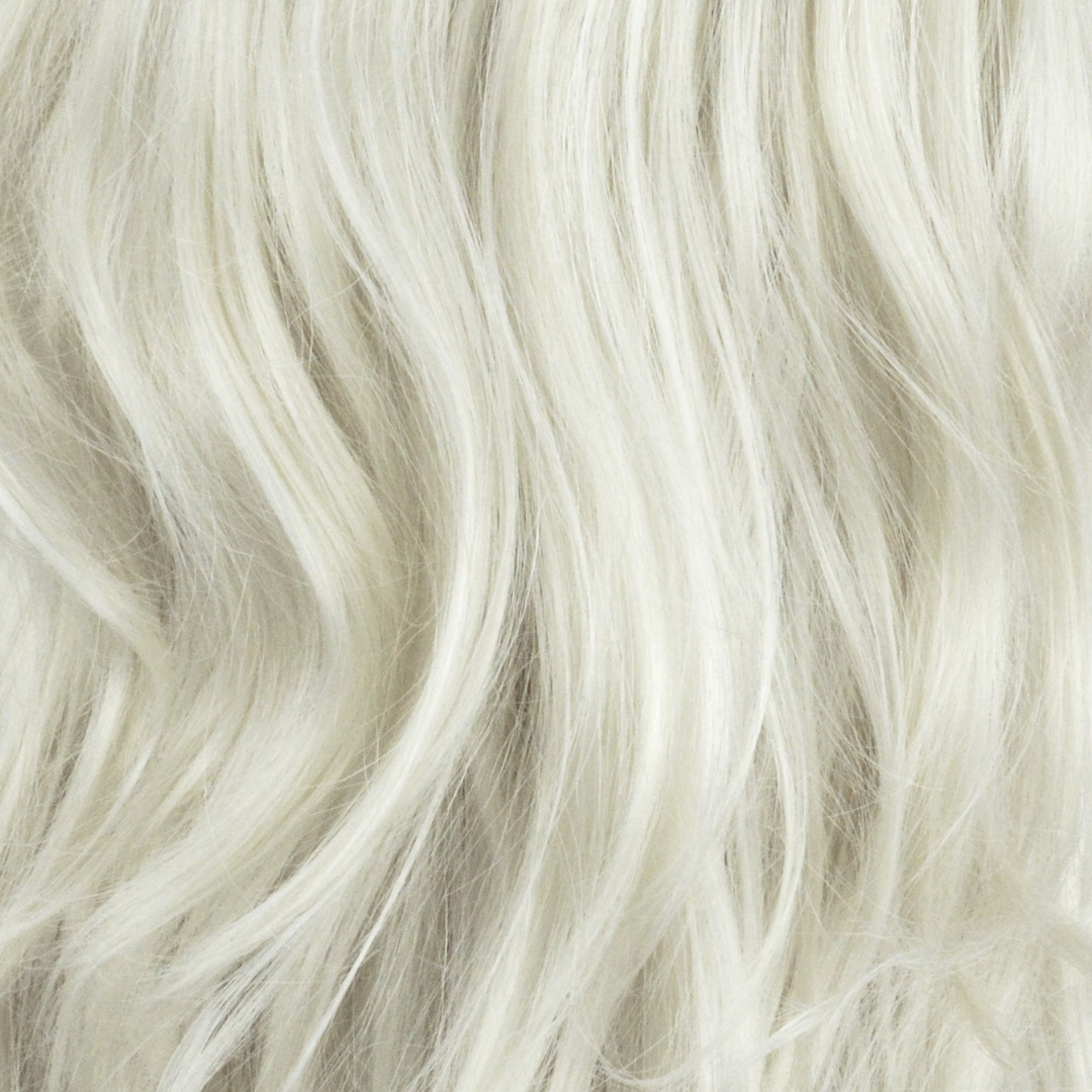 Soft flowing platinum blonde waves of Extra Hair Extension Piece - Platinum adding natural volume and shine